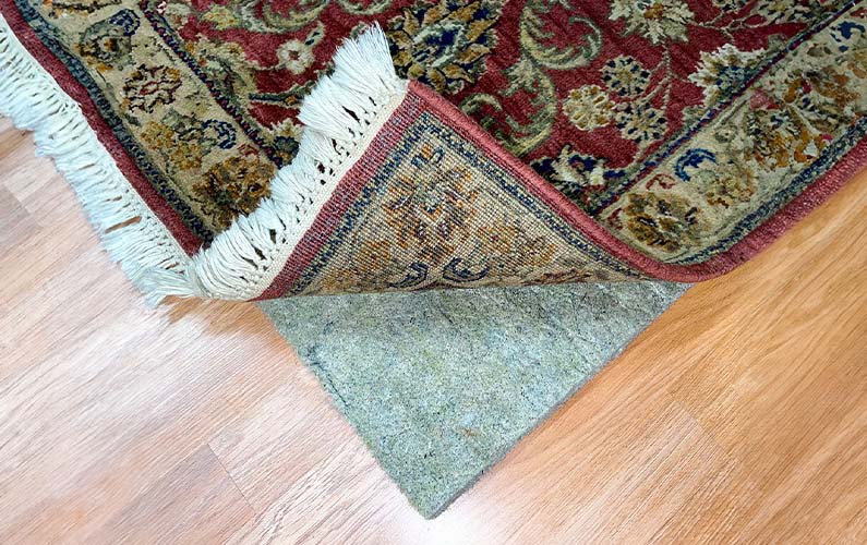 What’s Hiding Under Your Rug? Protect Your Floors the Right Way